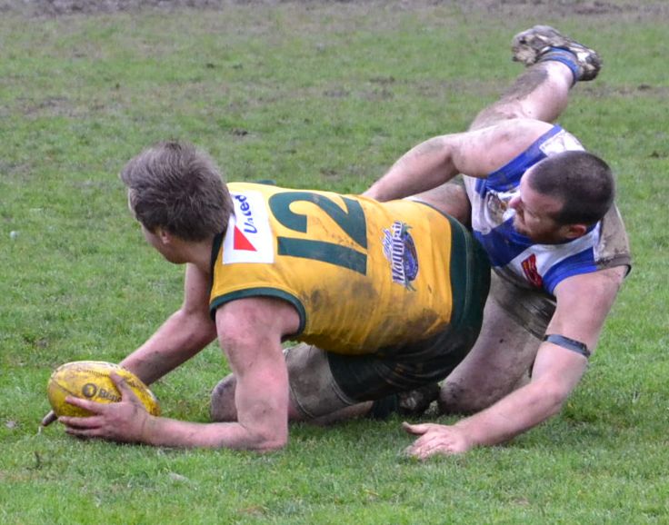 Cam Arnott is tackled