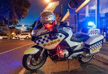 Motorcyclist suffers serious injuries police motorcycle