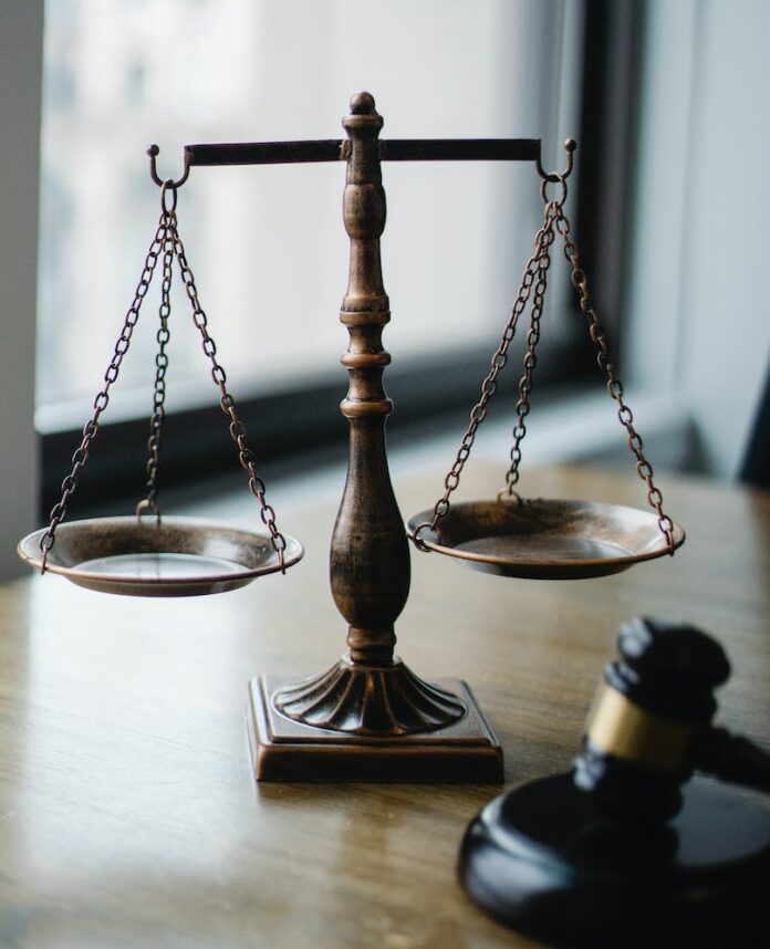 judgement scale and gavel in judge office