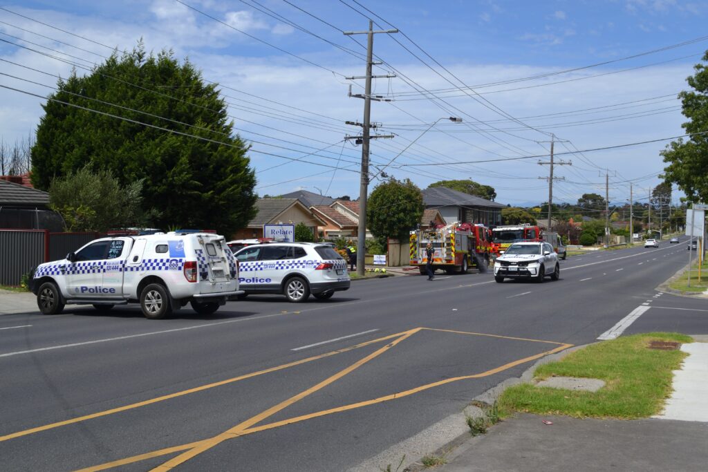 grimshaw street police fire ambulance wide shot