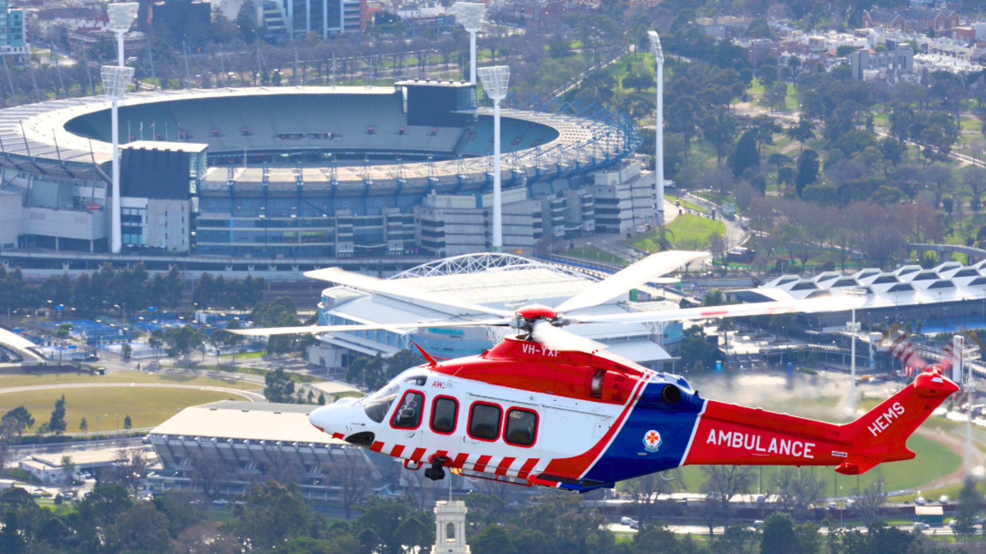 Air ambulance over the MCG air ambulance HEMS MCG
