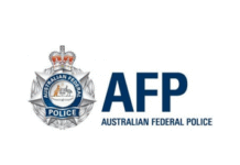 Melbourne man charged for alleged assault of airline crew and threats to kill during flight AFP federal police badge logo