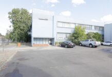 Man arrested following factory fire