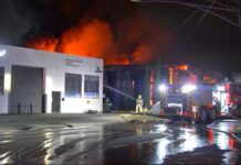 Firefighters battle suspicious factory fire airport west fire