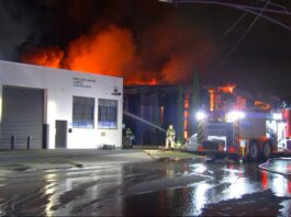 Firefighters battle suspicious factory fire airport west fire