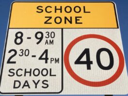 Lesson for motorists as kids head back to school school zone sign